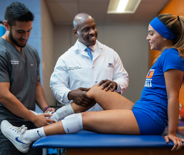 Sammyra, who had a knee injury, with Marvin Smith, MD, Vice Chief, Department of Orthopedic Surgery, Memorial Regional Hospital